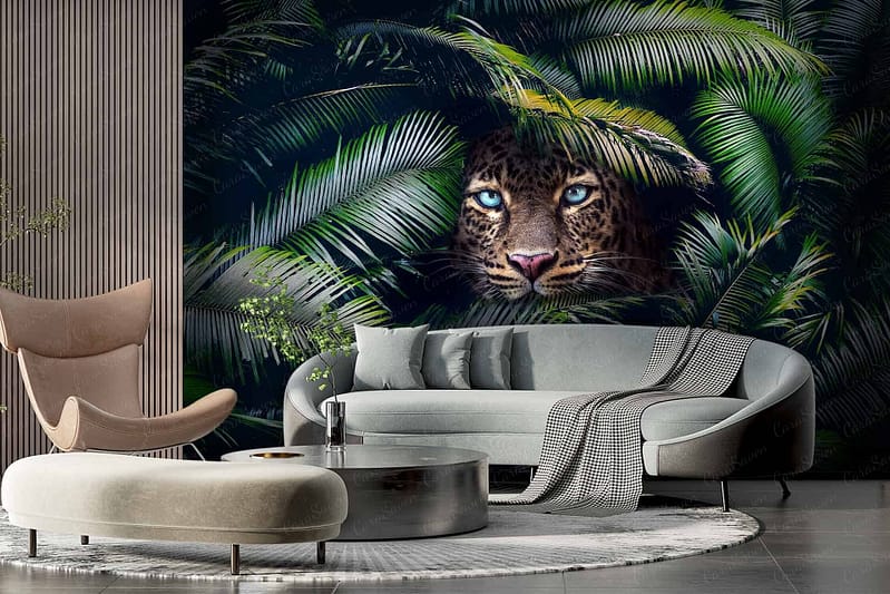 A striking wall mural features a leopard's face with piercing blue eyes, set against a backdrop of lush green leaves, creating an adventurous and exotic atmosphere. Key elements: leopard's face, blue eyes, green leaves.