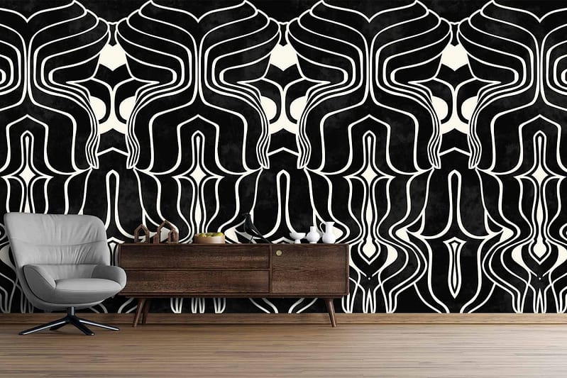 The wallpaper features an intricate, symmetrical abstract design in black and white, creating a bold and striking accent.