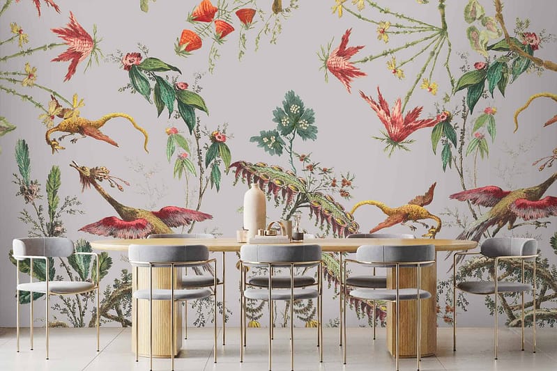 Botanical-themed mural with vibrant colors, featuring colorful flowers, lush green leaves, and various birds. The design captures a fantastical journey into nature. The elements include flowers in shades of red, pink, yellow, blue; leaves in different hues of green; and birds adorned with intricate patterns and multiple colors.