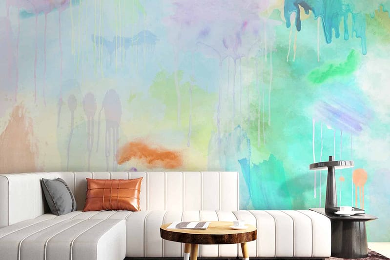Bright, colorful abstract watercolor-style wall mural with splashes of blue, green, and orange. Vibrant hues bring joy to the space.