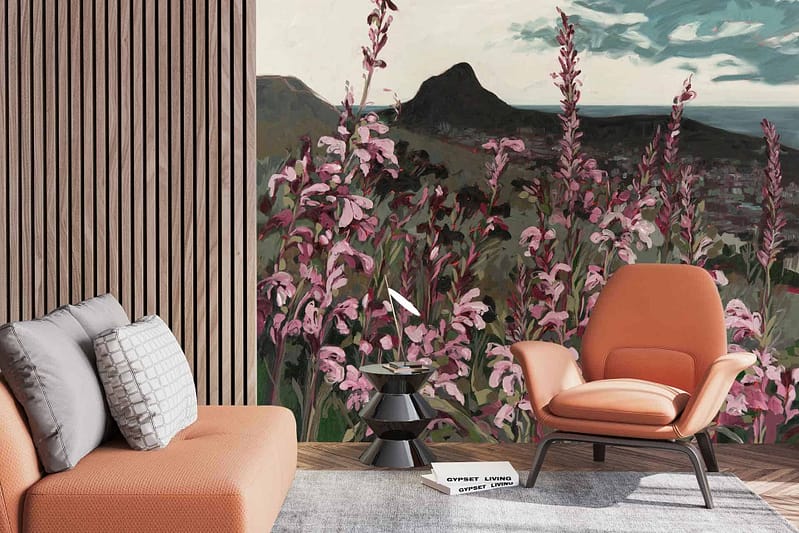Wallpaper mural featuring tall pink flowers with a mountainous landscape in the background. Elements: pink flowers, mountains, greenery. Colors: shades of pink, green, blue, gray.
