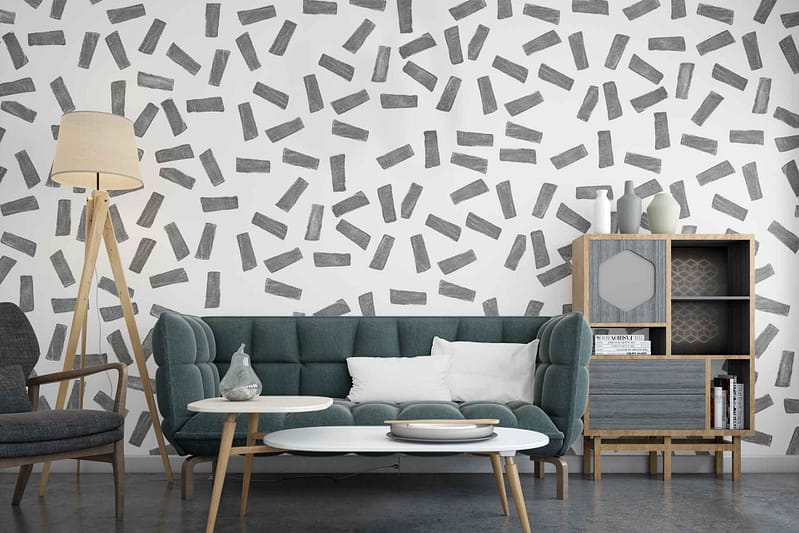 The wallpaper in the modern living room features a **black and white geometric pattern**. It adds a striking visual element with its **bold lines** and **contrasting shapes**, making it a focal point in the room's decor.