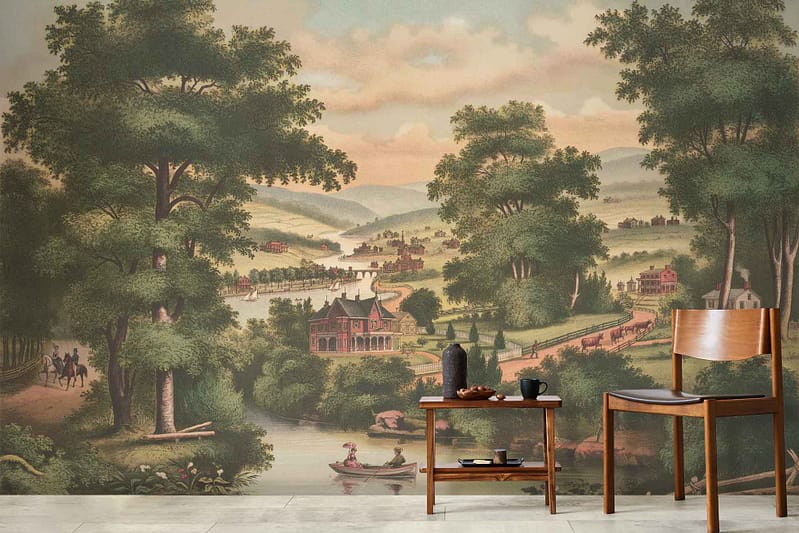 A mural on the wall showcases a pastoral scene with a river, boats, trees, and distant buildings. The wallpaper predominantly features calming shades of blue for the river and sky, lush greens for the trees, and earthy tones for the distant buildings.