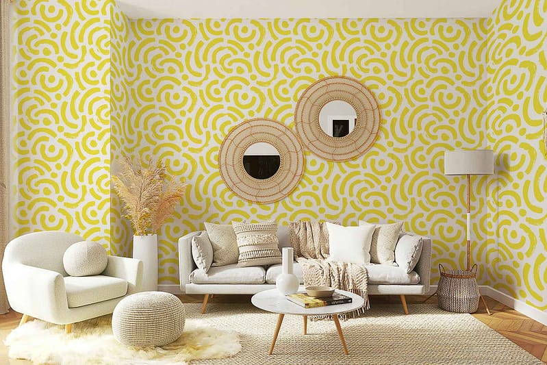 Vibrant yellow patterned wallpaper featuring intricate geometric shapes and floral motifs in shades of gold, white, and subtle hints of green.