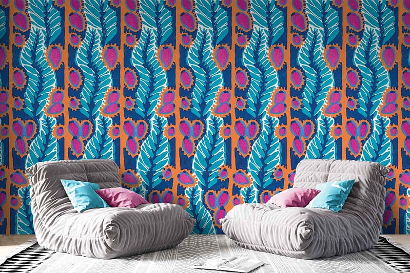 Vibrant wall featuring a bold, leafy pattern in blue, green, and magenta.