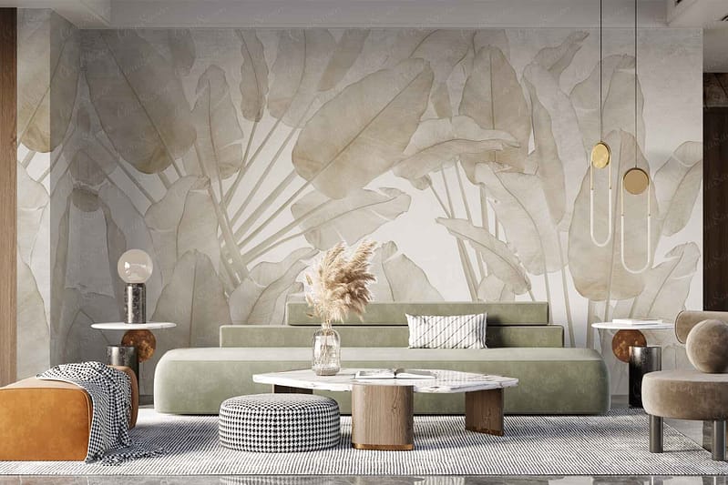 The living room's abstract leaf-patterned wallpaper features a blend of muted greens, soft whites, and subtle earthy tones. This design element acts as a sophisticated backdrop, adding depth and visual interest with its organic patterns that mimic natural foliage in a modern, stylish manner.