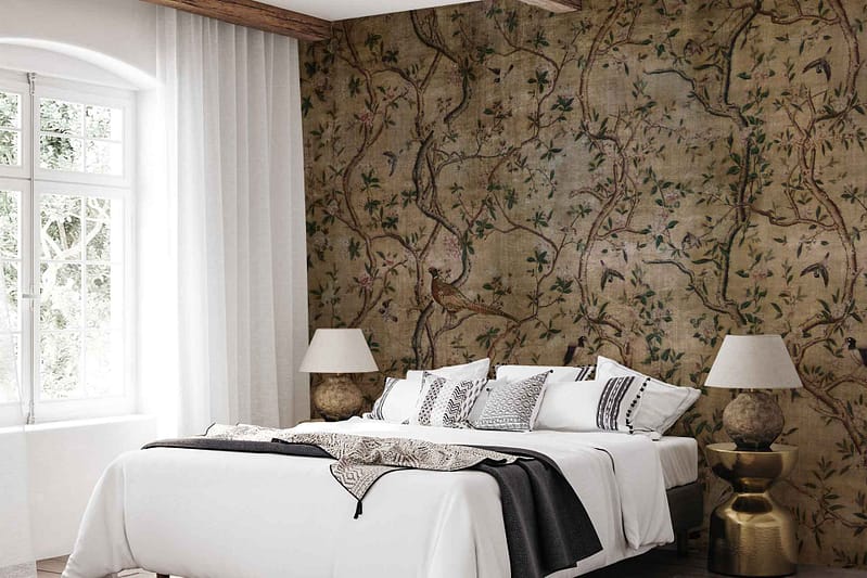 The wallpaper features intricately patterned branches, foliage, and colorful birds. It captures the beauty of seasons transitioning with a palette of vibrant hues. Key elements include detailed branches and various types of leaves mingling with birds in bright colors like red, blue, yellow, and green.