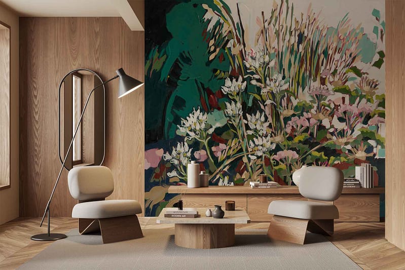 The wallpaper features a vibrant floral mural, reminiscent of the Aristea Capitata. It showcases bold, colorful blooms in shades of blue, purple, and green with detailed petals and leaves. The design adds a dynamic and refreshing aesthetic to the room's ambiance.