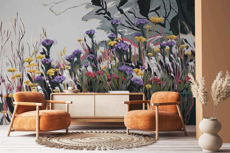 A vibrant mural with wildflowers in purple, yellow, and red hues, large leaves, and a serene background. Elements include dried pampas grass and Abstract Pincushion Proteas motifs.