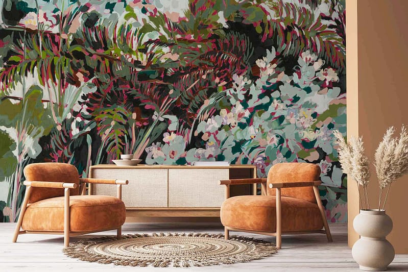 Vibrant floral-patterned wall mural with bursts of red, pink, orange, and yellow hues; inspired by the Abstract Pincushion Proteas collection.