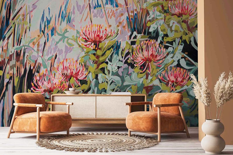The wallpaper showcases abstract patterns with pink and red hues resembling Pincushion Proteas.