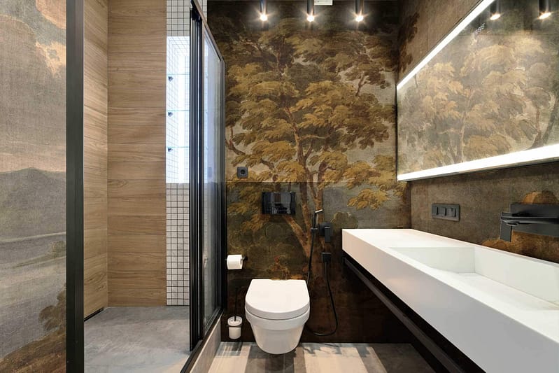 Natural, nature-themed wallpaper featuring a large tree. Elements: Tree branches, leaves, birds. Colors: Greens, browns, subtle blues. Tranquil ambiance.