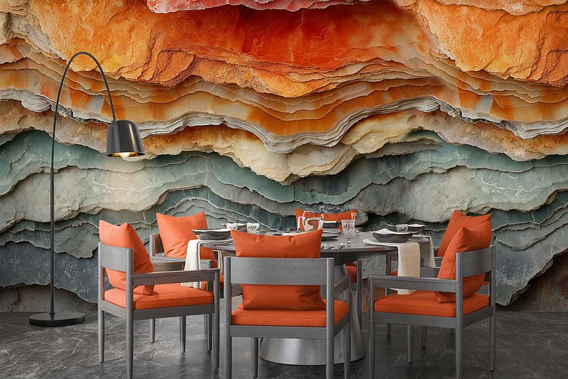 A dramatic, layered rock wall mural in shades of orange, brown, and blue acts as a stunning backdrop reminiscent of a Painted Horizon.