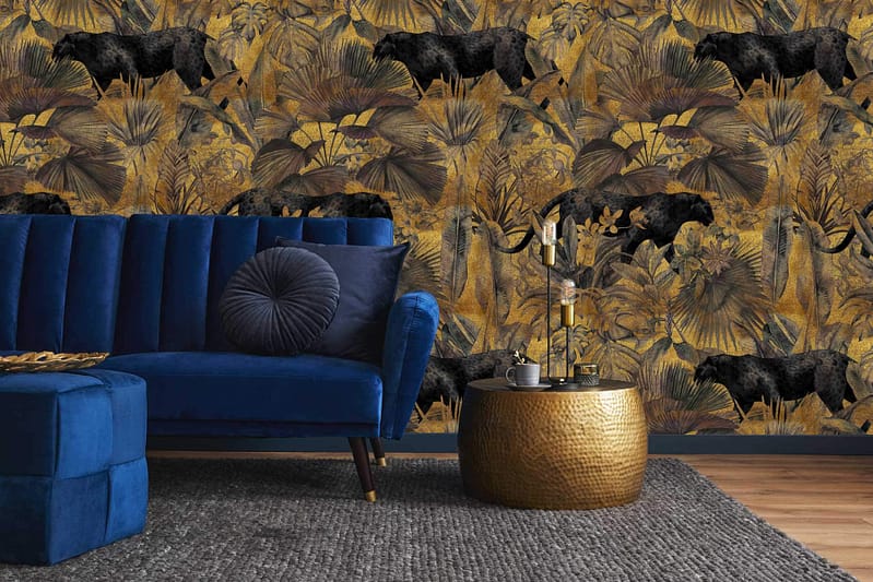 A stunning wallpaper showcases lush jungle leaves in varying shades of green, interspersed with majestic black panthers prowling and lounging. This dreamlike backdrop features intricate foliage, adding depth and an almost mystical quality, as if the scene might come alive. The rich greens and dark tones of the panthers create a captivating pattern perfect for a statement wall, infusing any room with an exotic and ethereal ambiance.