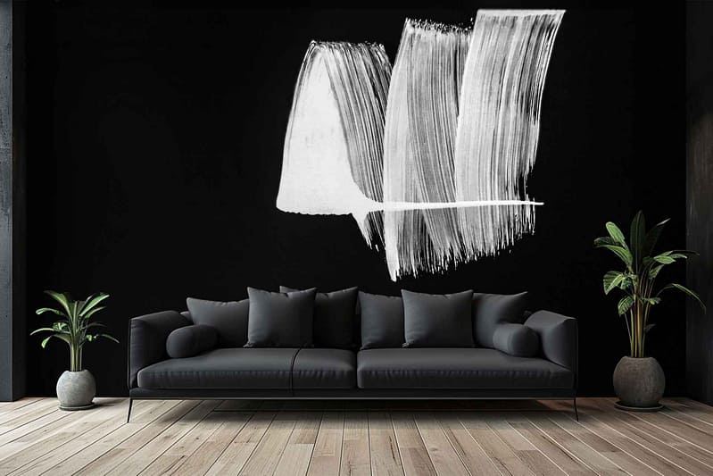 The wallpaper is solid black, designed to enhance the large, abstract black and white painting.