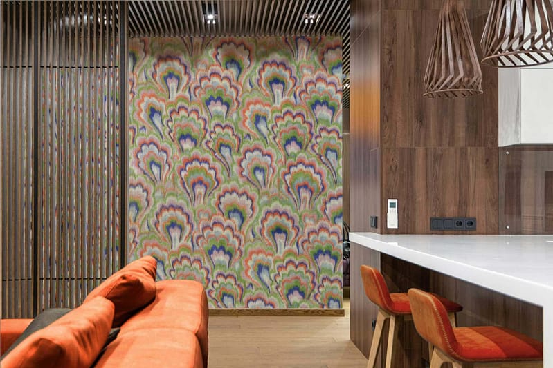 Peacock feather-patterned wallpaper featuring vibrant blues, greens, and golds. The intricate design includes eye motifs with shades of teal, emerald, sapphire blue, and hints of shimmering gold accents.