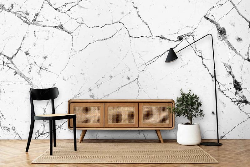 The wallpaper features a white marble design with intricate black veining.