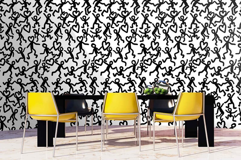 Black-and-white mural, numerous stick figures, various dynamic poses.