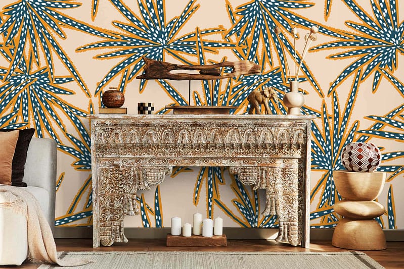 Vibrant patterned wallpaper featuring blue and yellow botanical designs. Elements include intricate floral motifs, leafy vines, and abstract botanical shapes in striking blues and yellows.