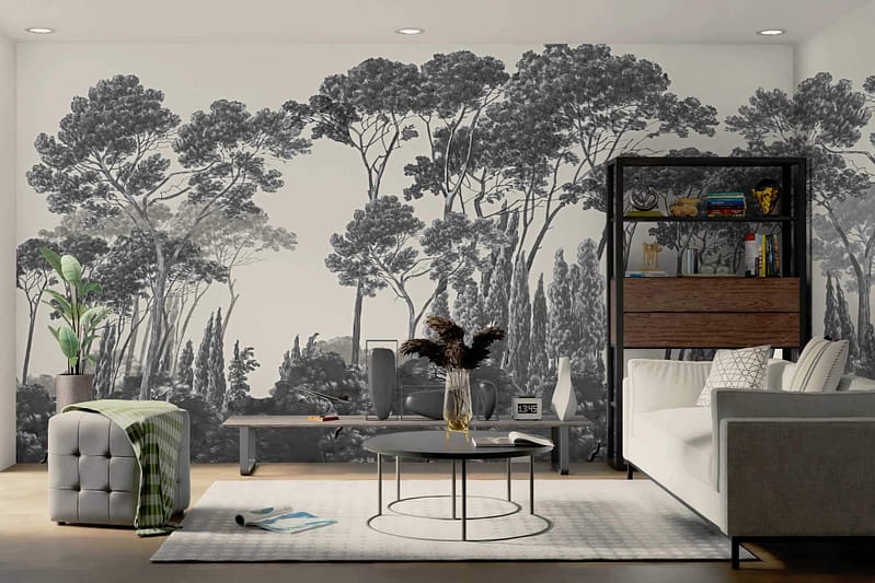 The wallpaper features a mural of tall trees. The elements include detailed tree trunks and branches, creating a natural and serene ambiance. The primary colors are shades of green for the foliage, with earthy browns for the tree trunks. This design brings an outdoor feel to the modern living room at Sixty Three.