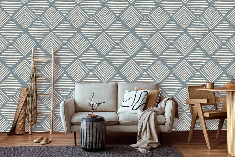 In the modern living room, the geometric patterned wallpaper serves as a striking focal point. The wallpaper features an intricate design comprised of interlocking shapes such as hexagons, triangles, and diamonds. The primary color palette includes muted tones like soft grays, gentle creams, and subtle beiges with occasional hints of metallic gold and silver to add a touch of elegance.

Bold yet subdued lines outline each shape, creating a sense of depth and movement across the wall. The pattern meticulously balances both larger and smaller shapes, which contribute to a visually dynamic yet harmoniously balanced backdrop.

The geometric elements on the wallpaper echo mid-century modern inspiration while maintaining a contemporary feel that perfectly complements the rest of the room's decor.