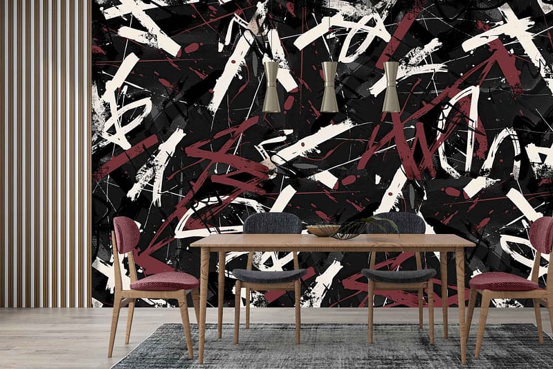 The wallpaper features a striking abstract mural with bold splashes of red, black, and white. This dynamic design adds an artistic flair to the room, serving as a captivating backdrop for minimalist furnishings.
