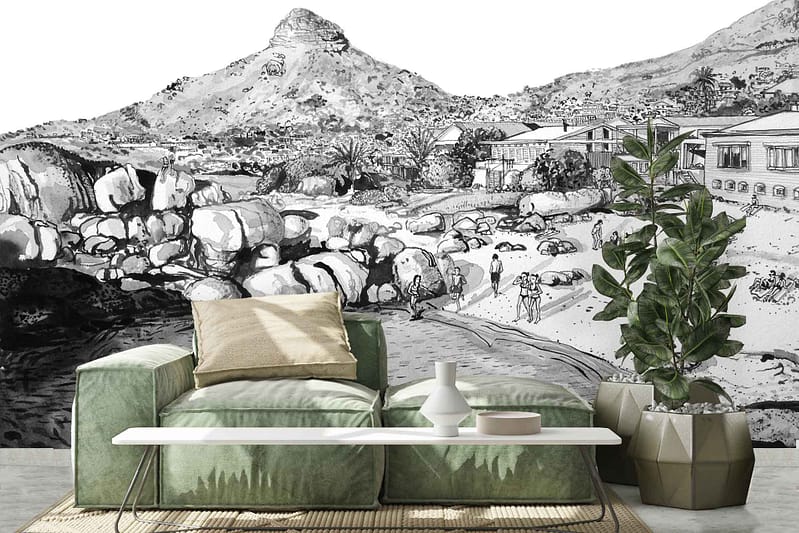 The black and white mural features a dramatic rocky landscape with a mountainous backdrop and a few distant buildings.