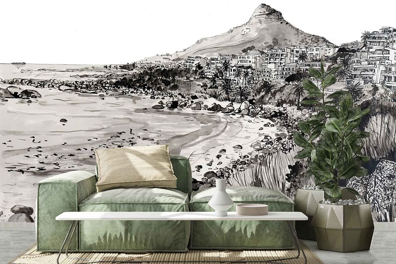 The wallpaper features a black and white mural depicting a coastal landscape. It includes elements like mountains, various buildings, and a beach scattered with rocks.