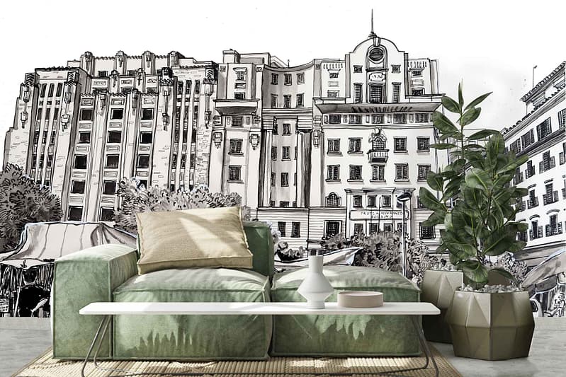 The wallpaper in the modern living room is an intricately detailed black-and-white mural featuring historic multi-story buildings. The design is monochromatic, utilizing shades of black, white, and grayscale to depict architectural elements such as ornate facades, tall windows, and classic rooflines. These colors combine to create a sophisticated and timeless backdrop that adds depth and interest to the space while allowing the furniture and decorations in front to stand out.