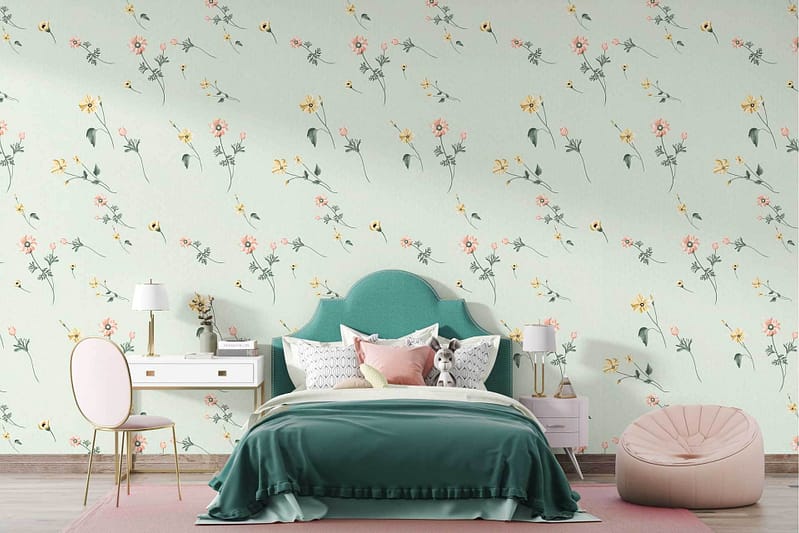 The bedroom features walls adorned with pastel floral wallpaper. The wallpaper includes soft pink, light blue, gentle lavender, and pale yellow hues depicting delicate flowers and greenery.