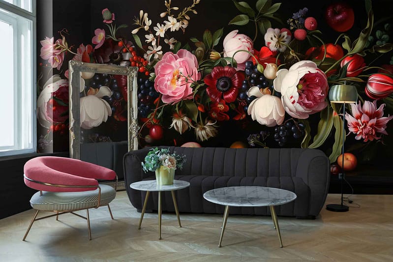 The modern living room features a stunning dark floral mural that spans an entire wall, serving as a captivating focal point for the space. The wallpaper showcases an intricate design of lush, oversized blooms in deep, dramatic hues. Rich shades of midnight blue and smoky charcoal form the background, allowing the florals to stand out vividly.

The flowers themselves are rendered in a palette of bold and sophisticated colors: velvety burgundy petals contrast with delicate ivory blossoms accented by soft blush undertones. Stems and leaves intertwine gracefully, painted in gradients of emerald green and muted olive tones. Highlights of golden yellow stamens bring a touch of warmth and brightness to the overall scheme.

Accents of muted lavender and dusky mauve are subtly woven throughout the design, adding layers of depth and complexity. This dark floral mural exudes an aura of elegance and timeless beauty, infusing the room with artistic flair while complementing its contemporary decor elements perfectly.