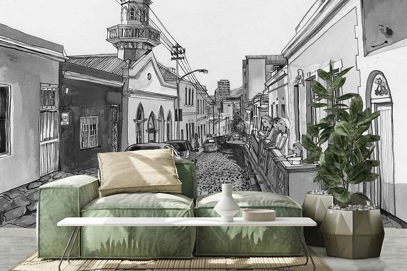 The wallpaper features a cobblestone street with old buildings, capturing the charm of De Waal Park. It includes elements like rustic architecture and textured stone pathways, with a color palette of earthy tones, muted grays, and hints of historic detailing.