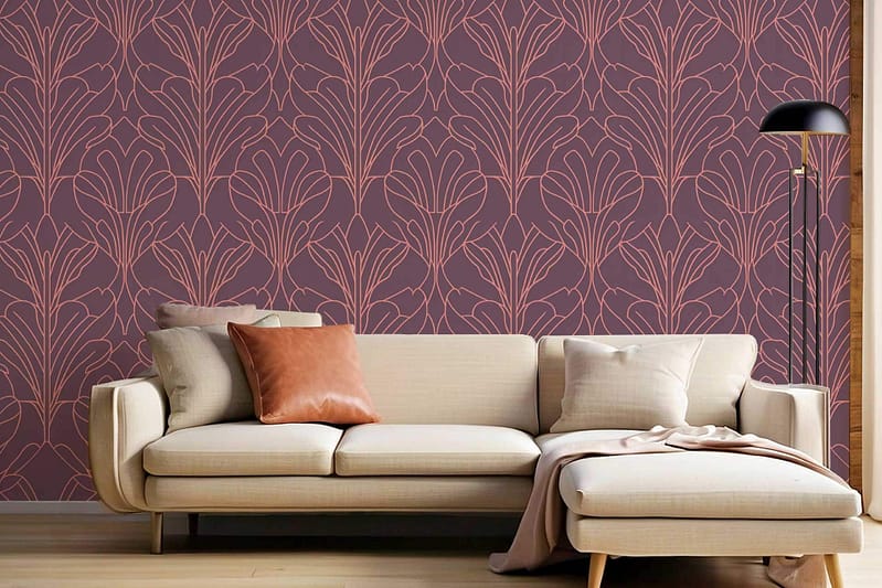 Mauve wallpaper featuring abstract leaf designs. The pattern includes organic shapes and intricate foliage motifs, predominantly in shades of mauve with subtle hints of deeper purples and soft greys, adding a textured appearance. The abstract elements create a contemporary yet elegant backdrop for the living room setting.
