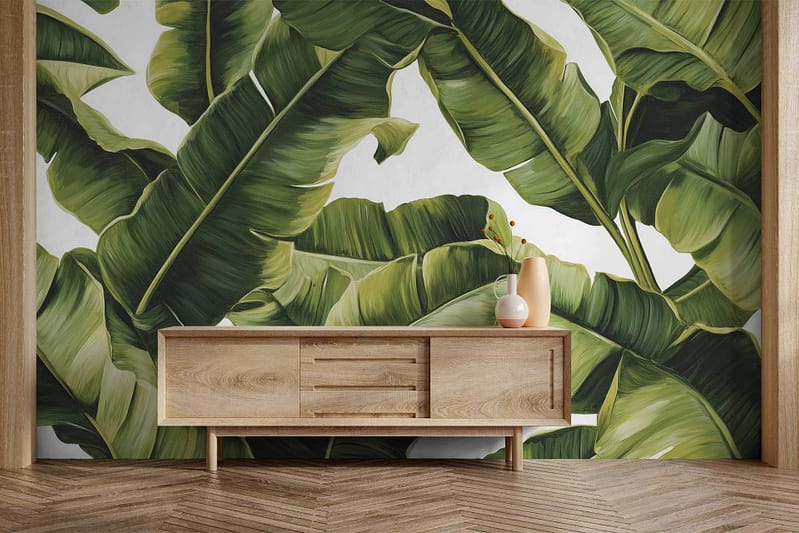 Large vibrant banana leaf mural; tropical theme; green hues; bold leaf patterns.