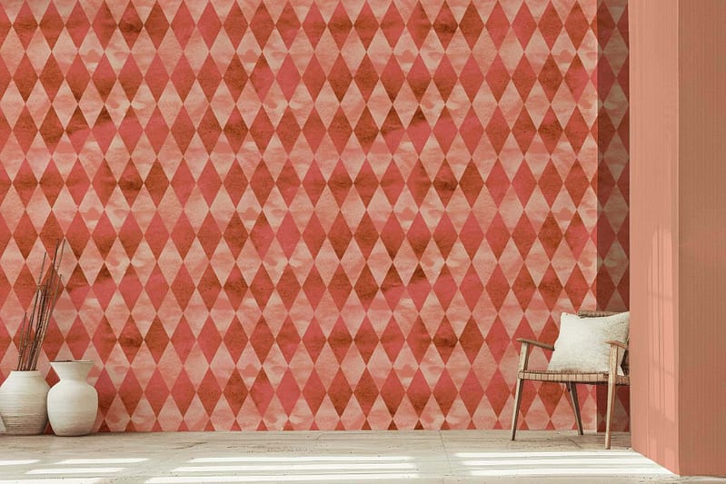 Diamond-patterned wallpaper combines pink and orange hues.