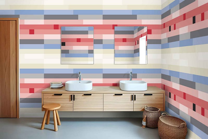 The bathroom features a harlequin charm with colorful, striped wallpaper in **pink**, **blue**, and **beige** tones.