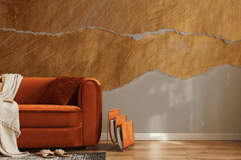 Textured golden abstract artwork on the wall; features gold tones with dynamic, textured patterns.