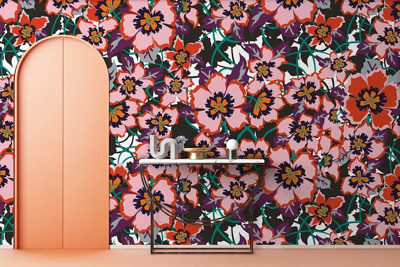 Vibrant floral wallpaper with large red and pink flowers on a lively backdrop.