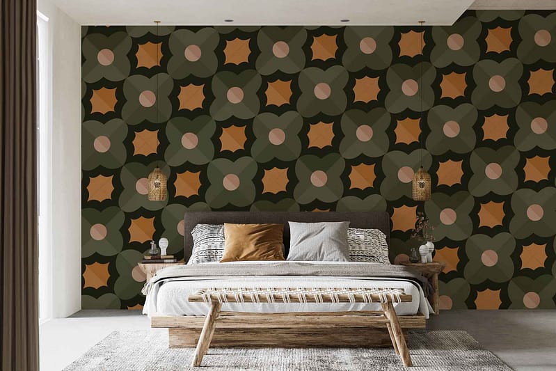 The wallpaper is a striking geometric design with star shapes. It predominantly features vibrant orange and green hues, creating a bold, eye-catching pattern perfect for a modern bedroom setting.