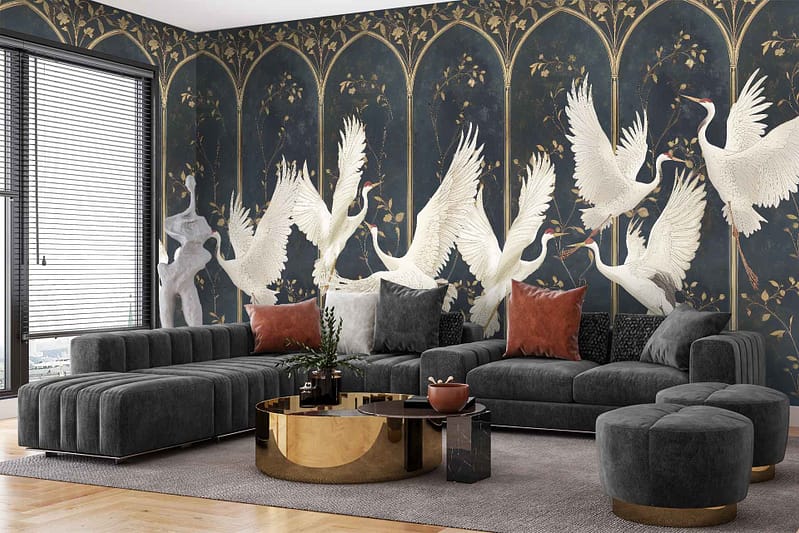 The wallpaper features a mural of white cranes soaring in the breeze. The backdrop is dark and nature-inspired, adding an elegant contrast to the living room decor.