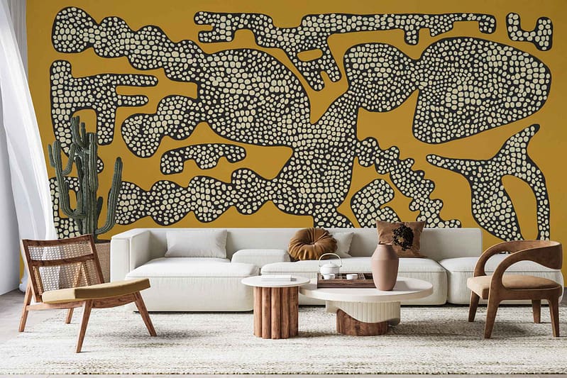 Abstract patterned mural on mustard yellow wall: Features bold geometric shapes, swirling lines, and overlapping circles. Dominant colors include deep blues, rich greens, burnt orange accents, and subtle hints of white. Each element blends in a harmonious yet dynamic arrangement that adds depth and contrast to the living space.