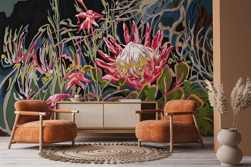 Colorful floral mural wallpaper with large pink and white flowers, prominent King Protea blooms, green ferns, and vibrant botanical details.