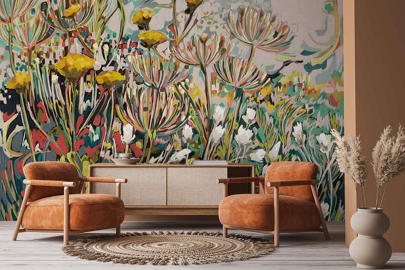 Colorful floral mural wallpaper featuring vibrant flowers in pink, orange, yellow, green, and blue tones with intricate botanical elements covering the wall.