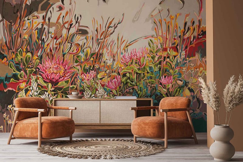 Wallpaper features a vibrant mural of King Protea blooms with bold pink petals, green and yellow abstract foliage, and artistic brushstrokes in rich, vivid colors.