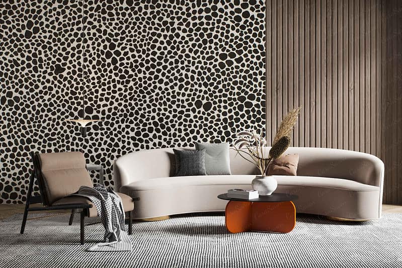 The wallpaper features a unique polka dot design that contrasts with vertical wood paneling. The polka dots vary in size and are playfully distributed, creating a dynamic visual texture. The contrast between the dots and the warm tones of the wood paneling adds depth and character to the room's aesthetic.