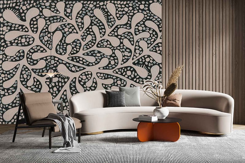 The wallpaper features a bold, organic pattern with flowing shapes that create a dynamic visual texture. It incorporates earthy tones like deep browns, soft taupes, and muted greens, interspersed with subtle hints of cream and off-white. The design evokes a natural, fluid movement reminiscent of leaves or waves, adding depth and interest to the contemporary space.