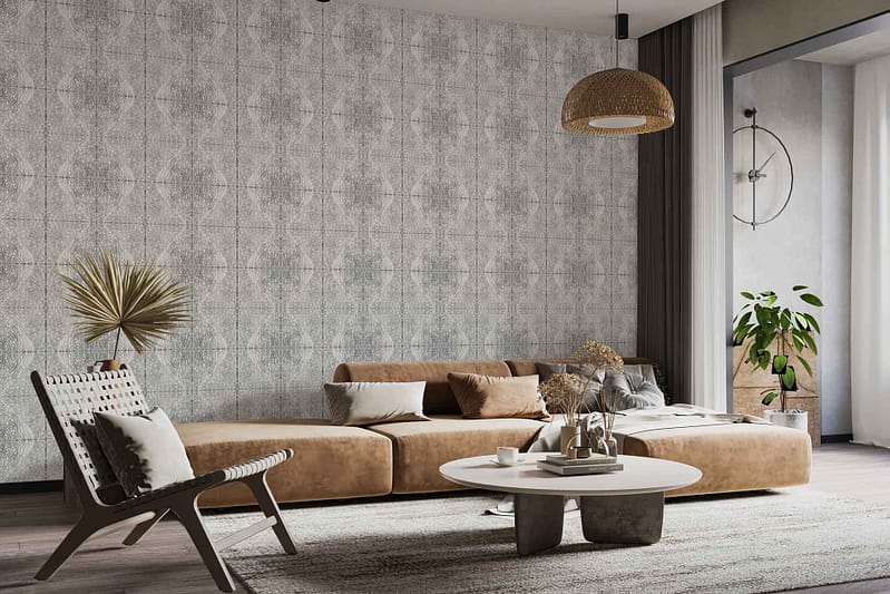 The wallpaper features a textured, patterned design with subtle geometric shapes and organic lines in shades of beige, taupe, and cream. It incorporates soft neutral tones that complement the room's natural color palette. The pattern offers depth through raised or embossed details, blending matte and slight sheen finishes for visual interest while maintaining a warm, cozy ambiance.