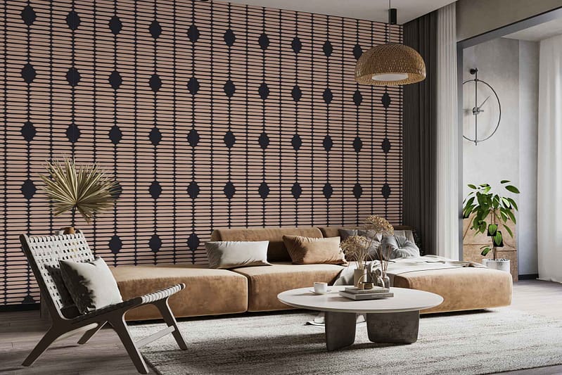 The wallpaper features a bold tortoise shell pattern with swirling shades of caramel, espresso brown, and golden amber. The organic shapes evoke natural textures, creating a striking focal point reminiscent of luxury animal shell motifs. Accents of black and honey infuse warmth and depth into the patterned wall.