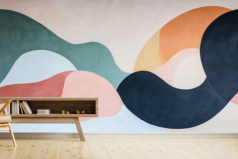 A colorful abstract mural wallpaper features interwoven shapes in green, peach, and black.