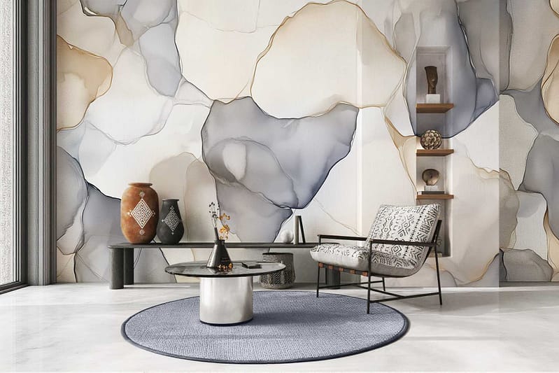 The abstract marble wallpaper features swirling patterns in deep navy, soft powder blue, white, and subtle hints of gold veining. The design blends bold blue marbling with fluid gray and ivory accents, creating a luminous yet dramatic effect. Touches of metallic gold lines add luxury and depth to the overall look.